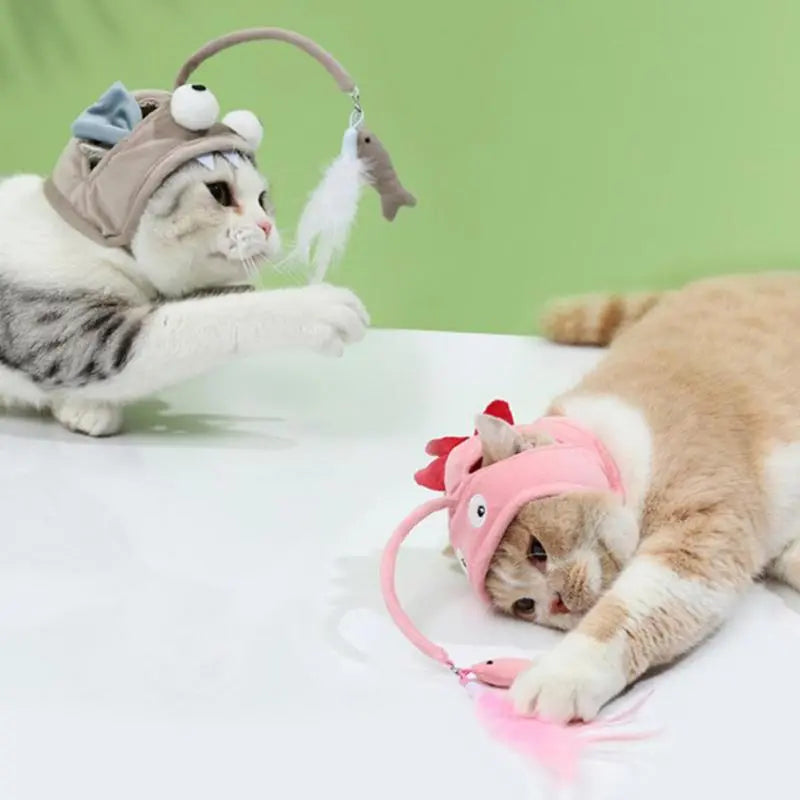 Cat toy hat for pets, showing a cat engaged with the feather pendant, promoting activity.