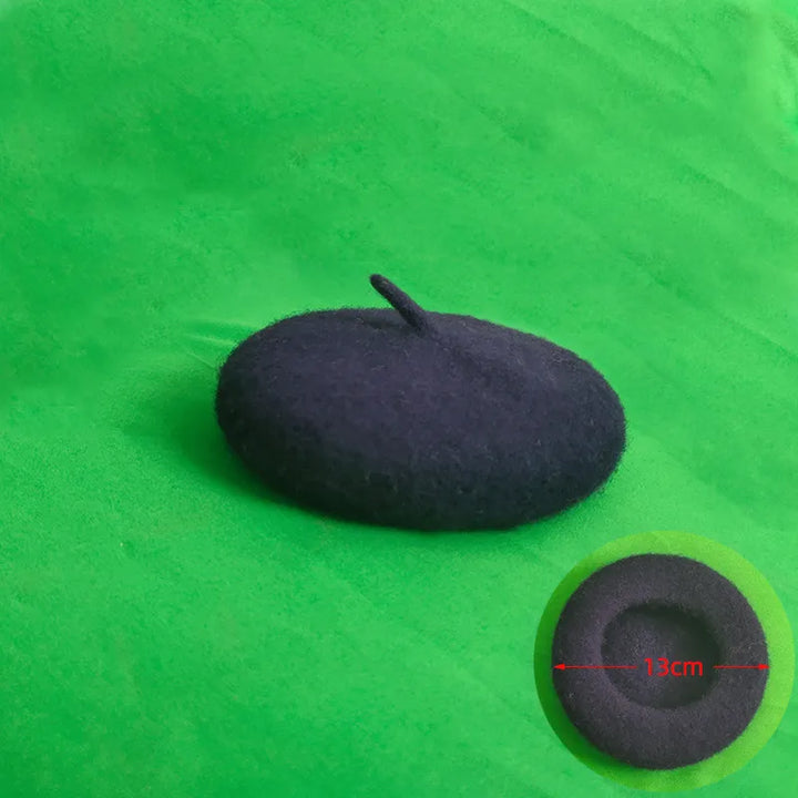 Pet modeling a pink felt beret, a fun and cute pet accessory.
