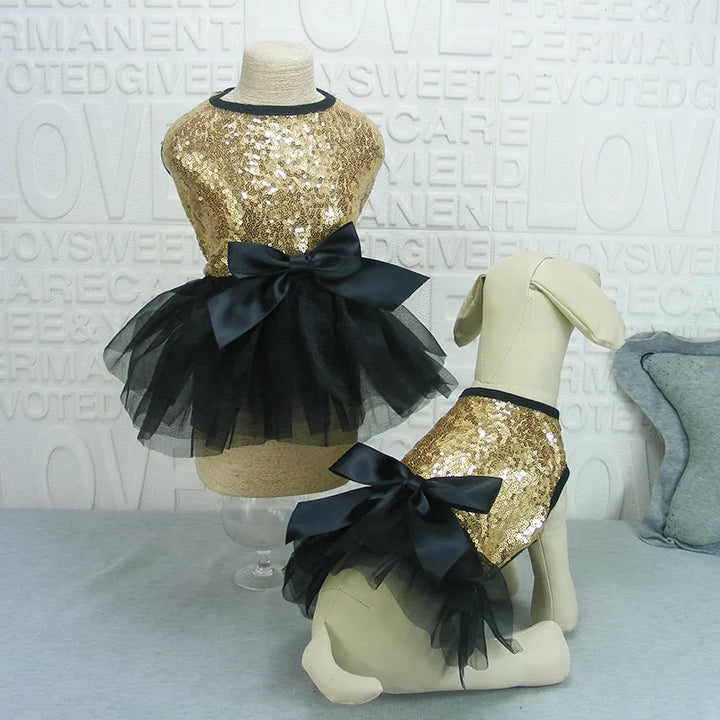 Dog glitter tulle party dress on a hanger, showcasing full skirt and pet apparel design
