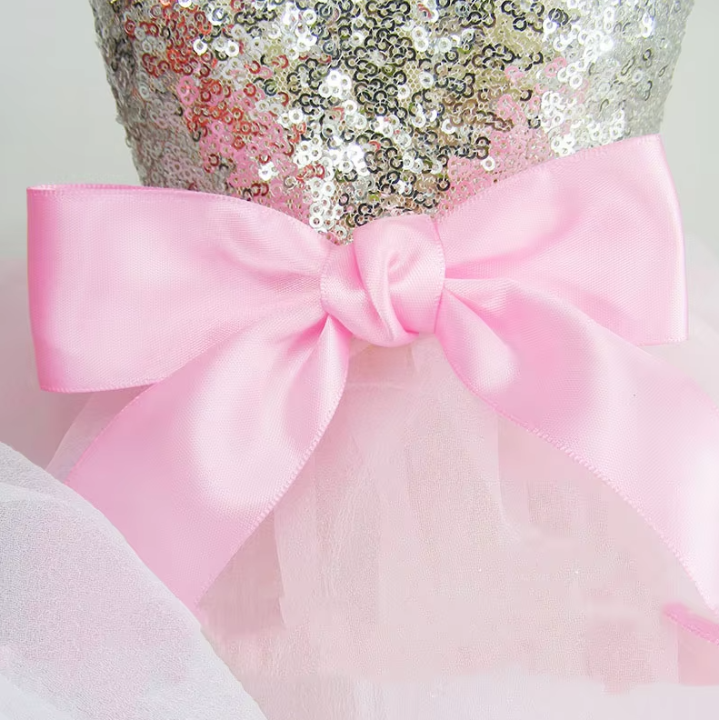 Back view of dog glitter tulle dress displaying fluffy multi-layered skirt & secure fastening