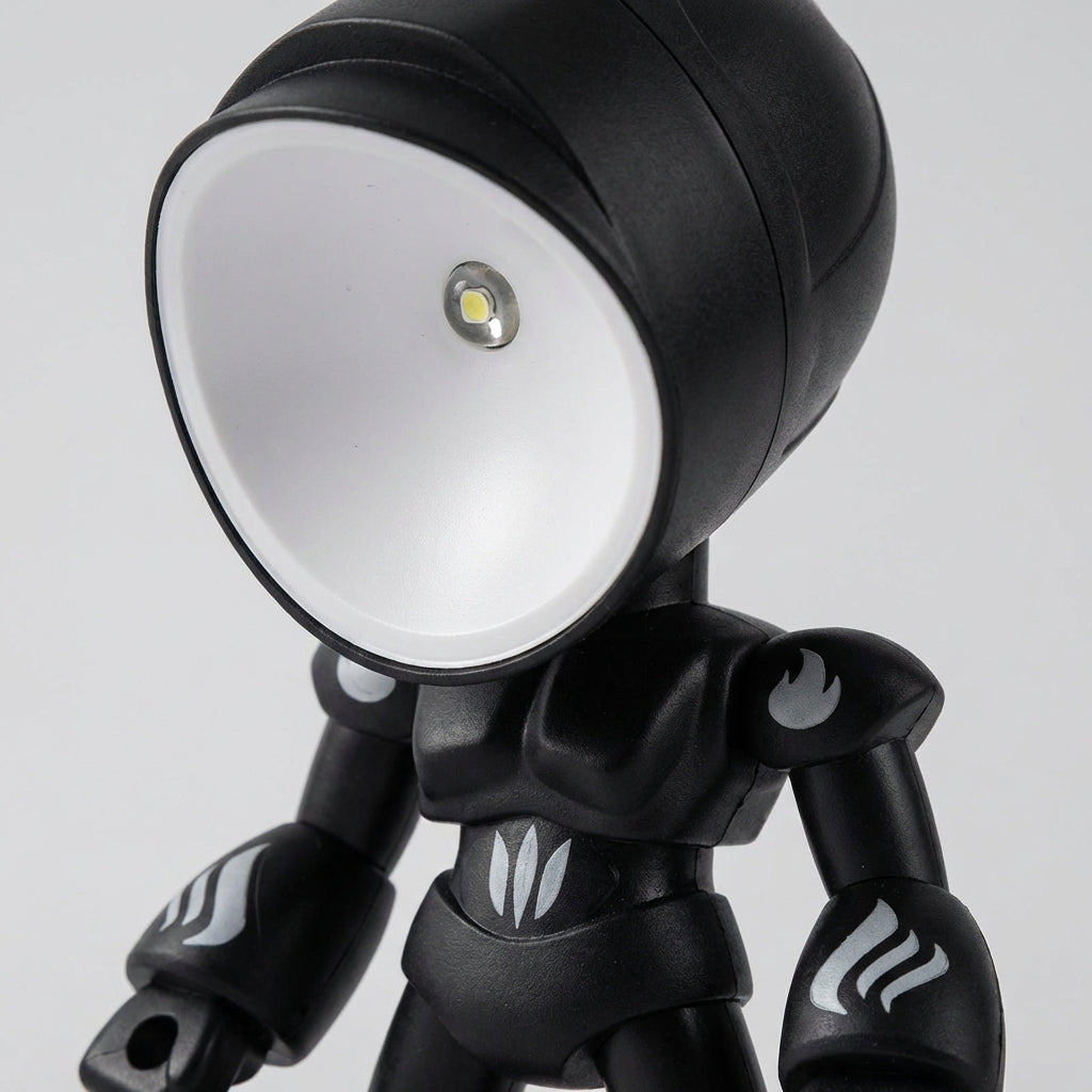 Compact robot table lamp, Luminobot, with soft LED light for kids' bedroom, great for reading & night light.