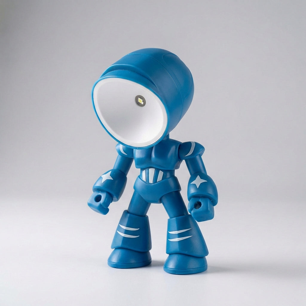 Children's robot lamp, Luminobot, compact LED bedside light, soft & glare-free for kid's room decor.