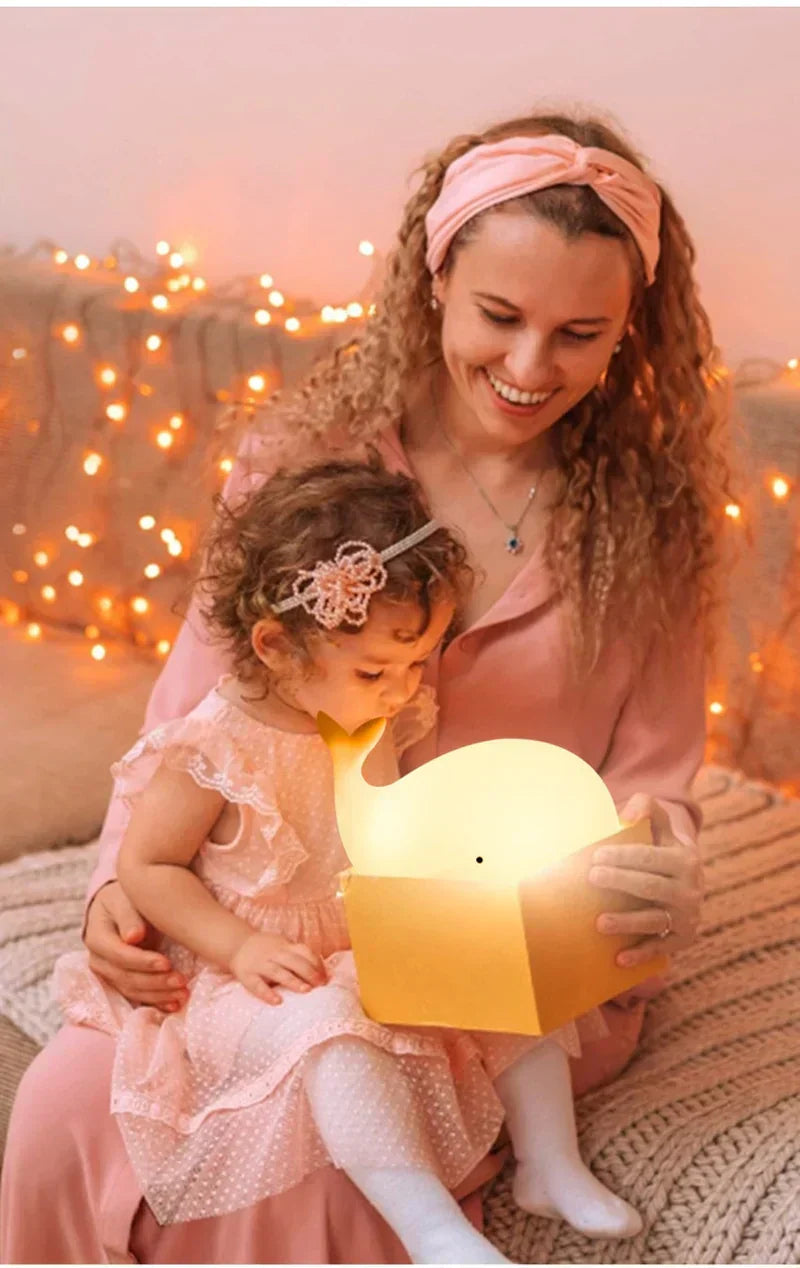 Adorable color-changing whale lamp, a comforting LED night light for sweet dreams in a child's room.