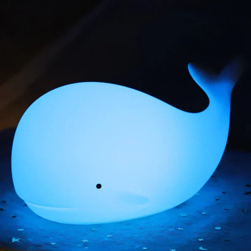 Cute whale night light, a delightful color-changing LED lamp for a baby nursery or kids' bedroom.