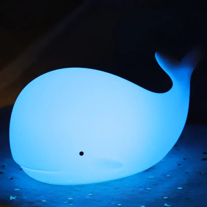 Cute whale night light, a delightful color-changing LED lamp for a baby nursery or kids' bedroom.