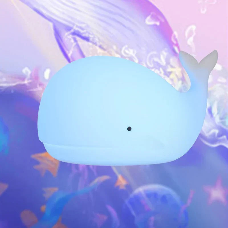 Flexible silicone whale night light, offering a vibrant color-changing glow for any kids' room or gift.