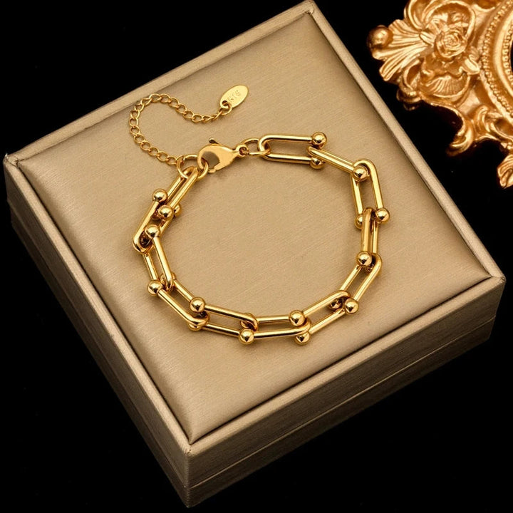Stylish gold link chain bracelet for women, perfect as a fashion accessory or elegant gift.