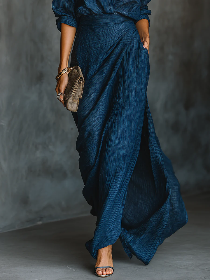 Sophisticated dark blue women's matching set, a classic long skirt and shirt coordinated outfit for timeless fashion.