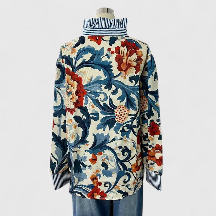 Comfort fit women's floral blouse in dark blue. Stylish and elegant top with a unique floral design for women.