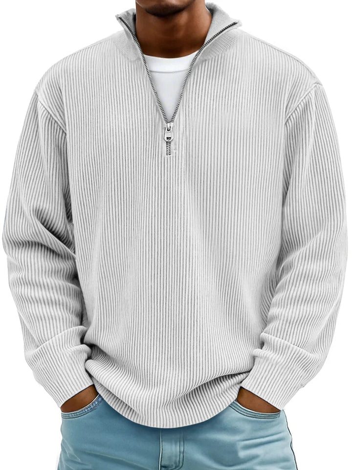 Men's casual half-zip sweater with ribbed knit texture. Great for versatile fall and winter layering.