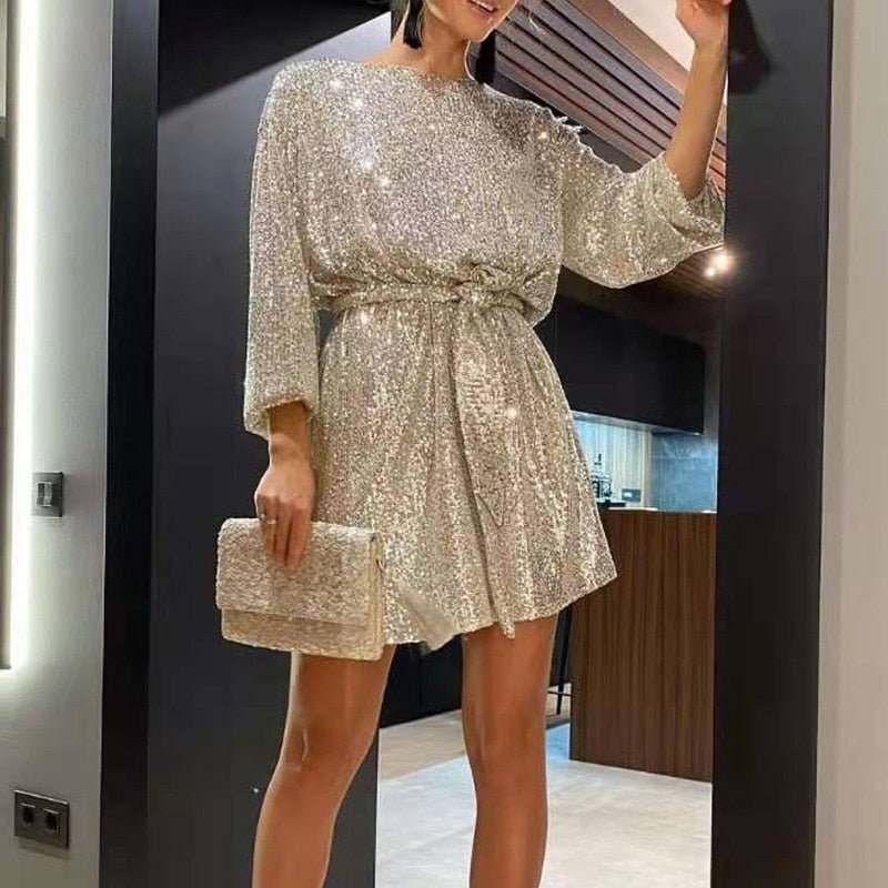 Women's sequin cocktail mini dress with sparkling details. A bestseller for glamorous parties.