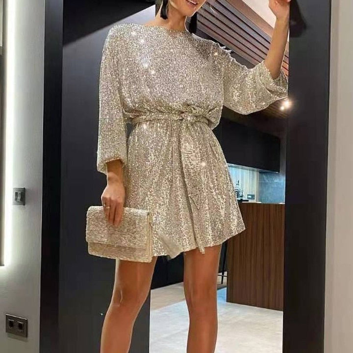 Women's sequin cocktail mini dress with sparkling details. A bestseller for glamorous parties.