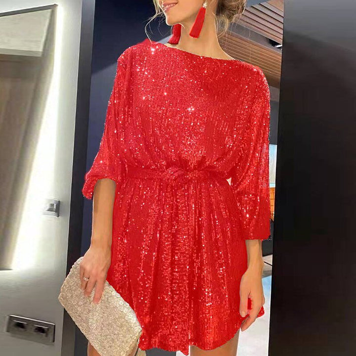 Dazzling purple sequin mini party dress. Bestselling loose-fit style for women's special occasions.