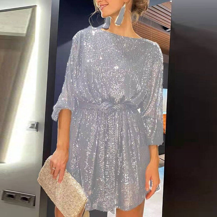 Women's sequin evening mini dress, shining brightly. A glamorous choice for any special occasion.