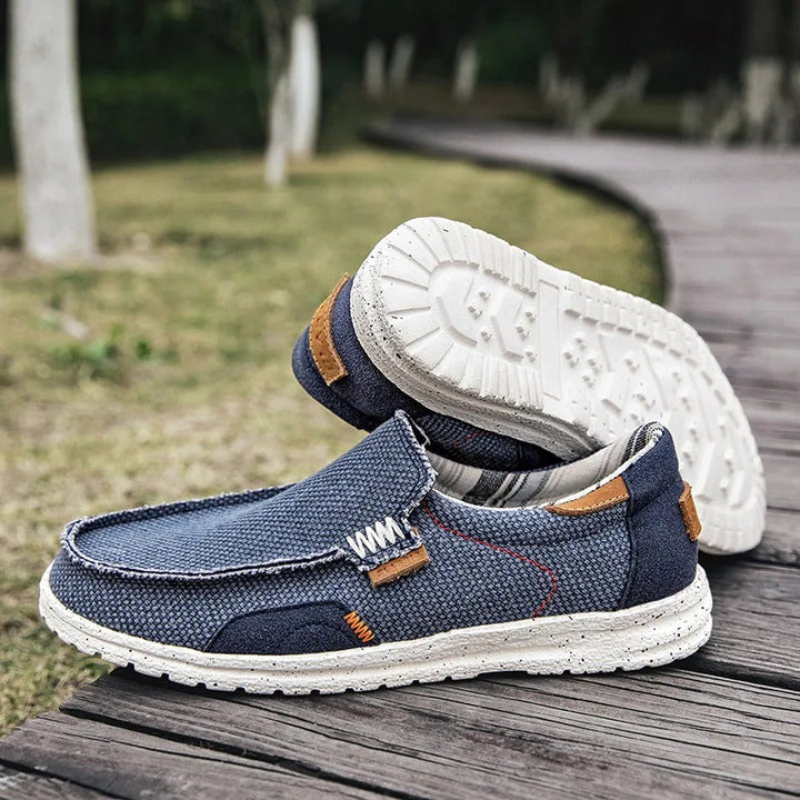 New men's khaki Dockstone slip-on canvas shoes, comfortable and durable everyday loafers.