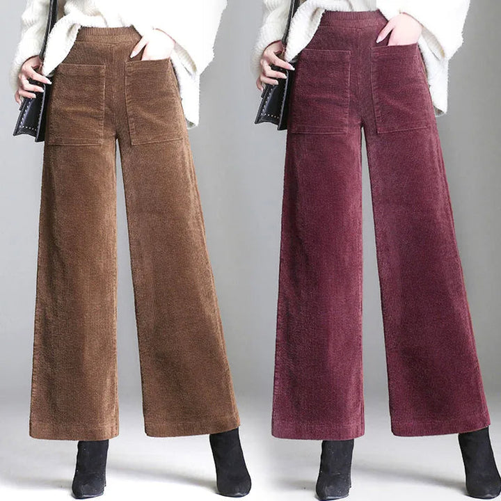 Chestnut brown high-waist flare trousers for women, featuring retro style and practical front patch pockets.