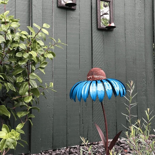 Outdoor bird feeder featuring a decorative metal coneflower design, perfect for attracting wild birds to your garden.