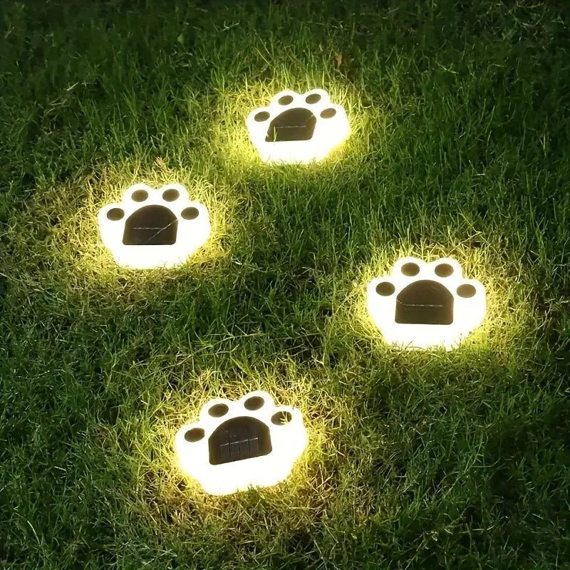Decorative paw print solar garden lights, perfect for outdoor pathway illumination and patio decor