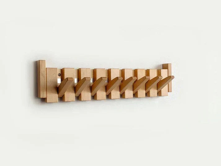Decorative wall mounted piano coat rack for entryway. Space-saving home storage and organization.