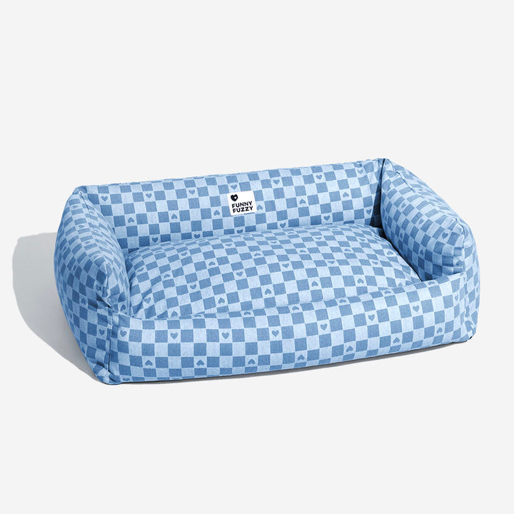 Pet accessory: deep sleeping dog sofa bed featuring a useful reversible mat