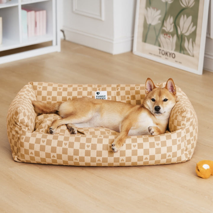 Dog accessories: deep sleeping sofa bed with comfortable reversible plaid mat