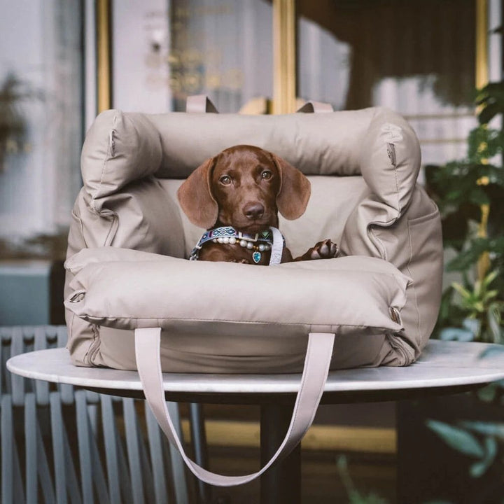 Luxury faux leather booster pet seat, waterproof and soft, perfect travel accessory for dogs
