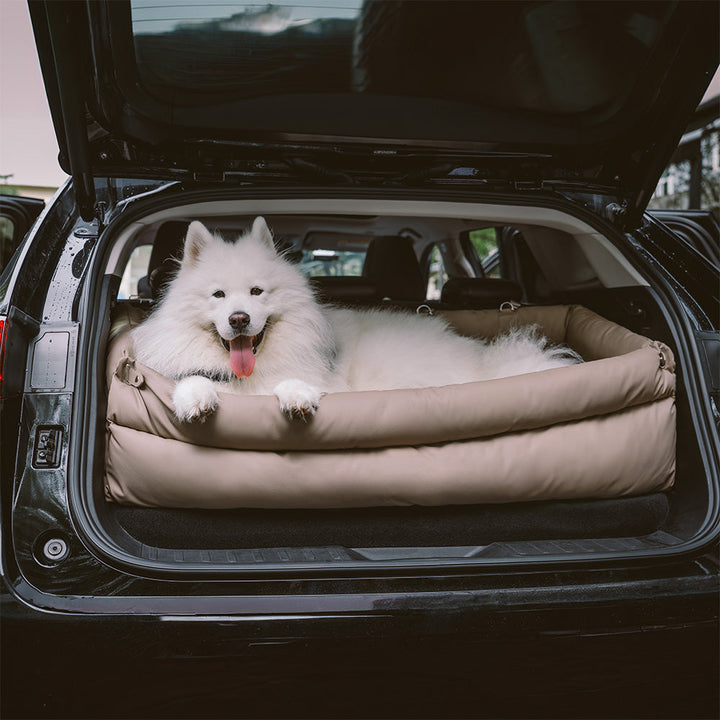 Elevated faux leather dog car seat booster bed in tan, ensuring pet visibility