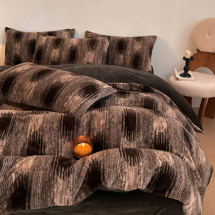Beautifully draped velvet floral sheets on a bed, showcasing the double-sided design and softness