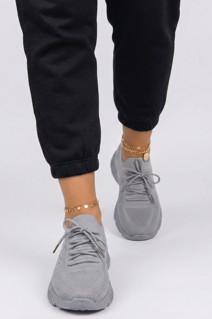 Textured sole detail on women's comfort lace-up athletic sneakers, providing enhanced grip for walking.