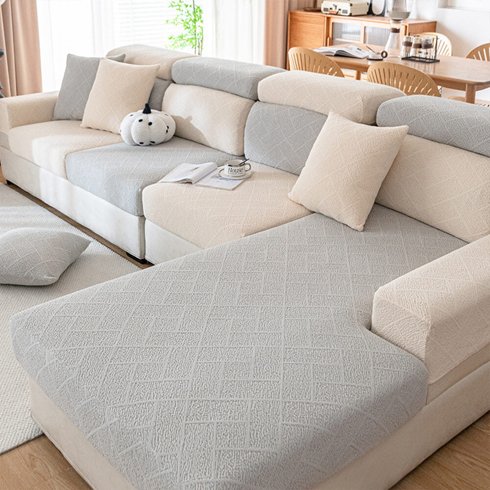 Tactile view of the diamond jacquard plush fabric, emphasizing its soft and durable quality