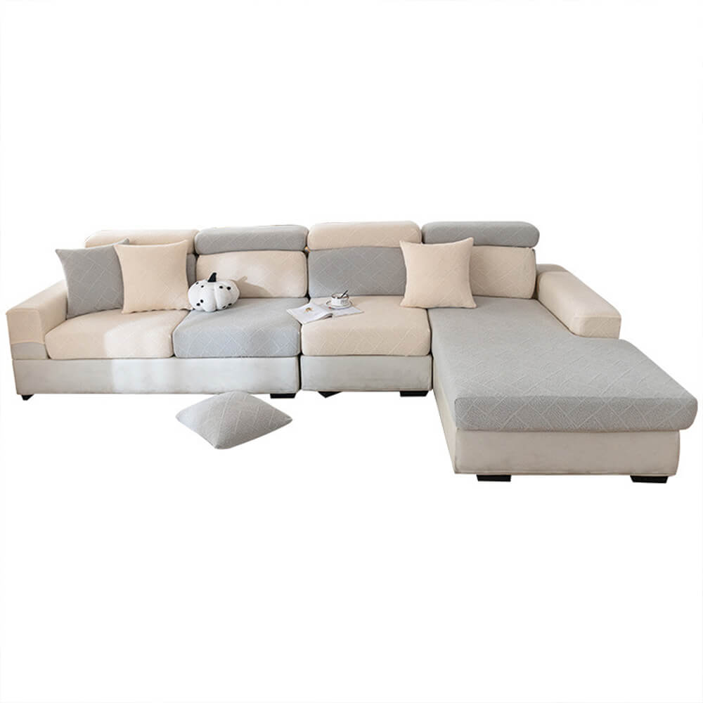 Full-cover stretch couch protector ensuring a neat, wrinkle-free look on a modern sofa