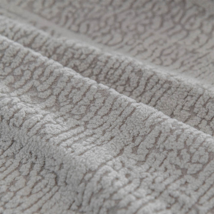 Elegant diamond jacquard plush sofa cover, a stylish and practical home decor upgrade