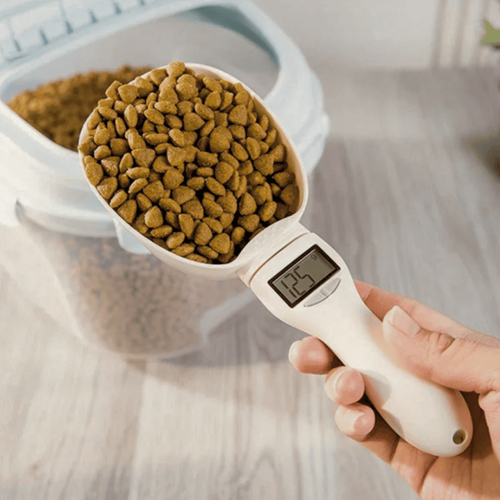 Electronic pet food scoop with integrated digital scale, perfect for precise kitchen measuring and pet feeding