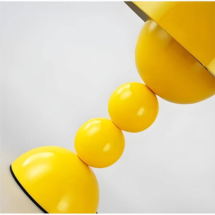 Scandinavian-inspired flower bud LED desk lamp, dimmable for focused or ambient light.