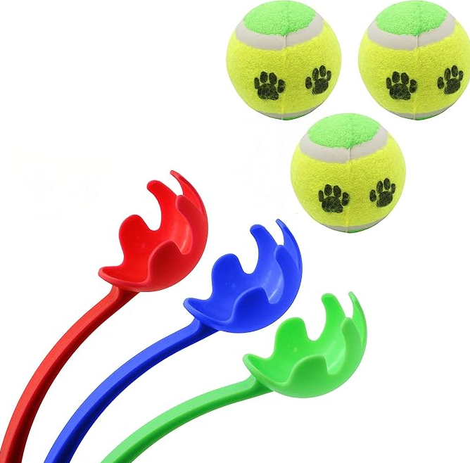 Active dog playing fetch with a yellow tennis ball launched by a blue dog ball launcher.