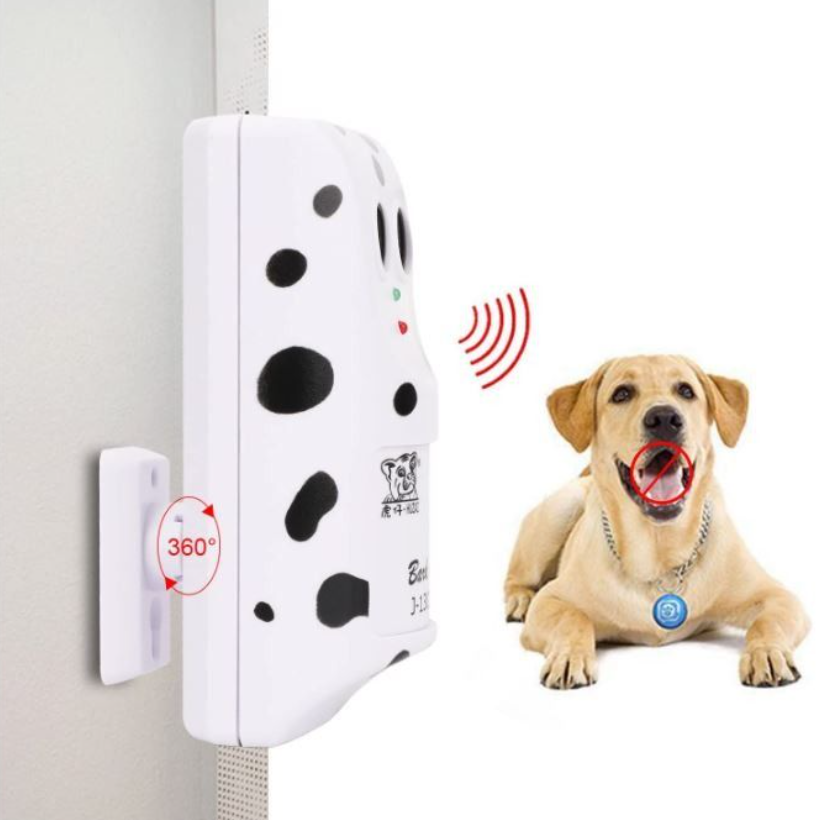 Close-up of ultrasonic dog training device, showing sound emitter & indicator light