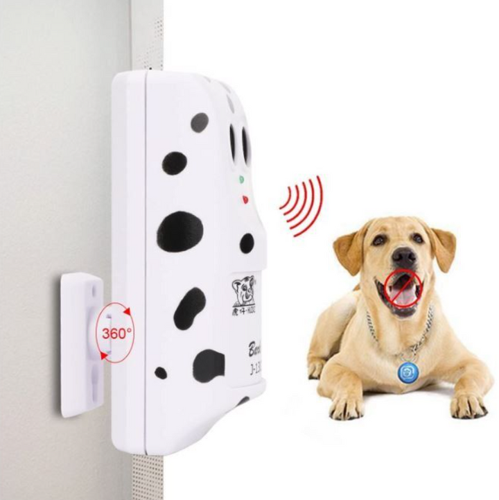 Close-up of ultrasonic dog training device, showing sound emitter & indicator light