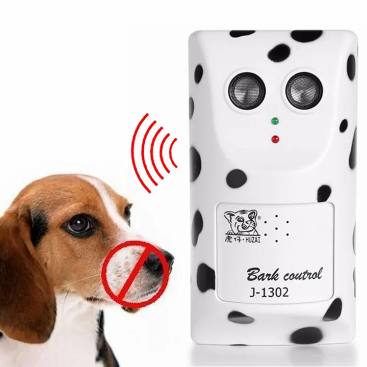 Dog barking at a squirrel, illustrating need for ultrasonic bark control device