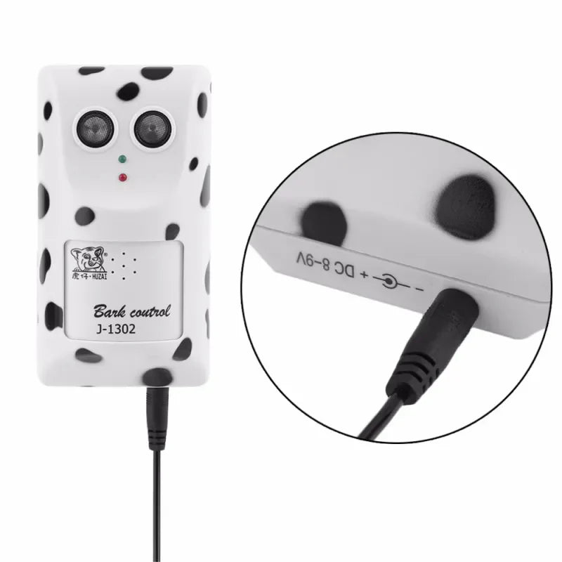 Dog responding to ultrasonic training device, showing improved behavior