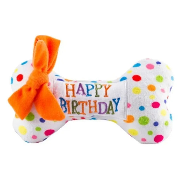 Soft plush cupcake dog toy with a squeaker inside, perfect for a dog's birthday celebration