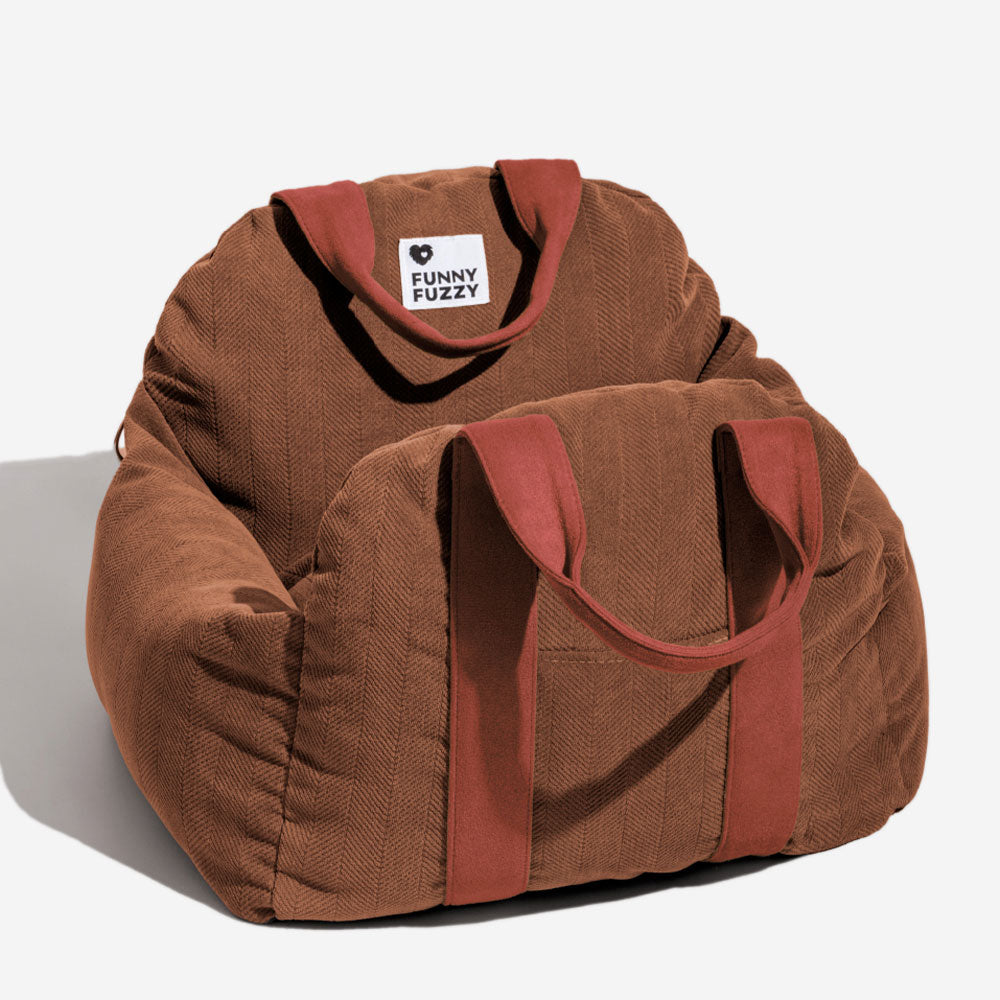 Side profile of the dog car seat, illustrating the high bolster walls for pet security and comfort