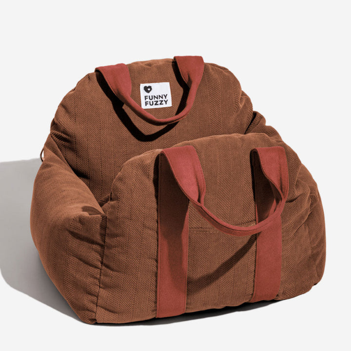 Side profile of the dog car seat, illustrating the high bolster walls for pet security and comfort