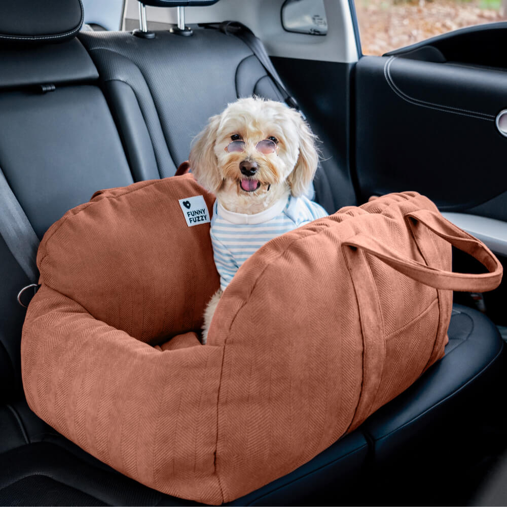 Dog car seat bed with elevated bolster sides, providing a cozy and safe pet travel experience