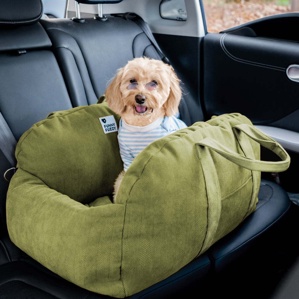 Empty dog car seat, showcasing spacious interior and thick bolster for puppy comfort during travel