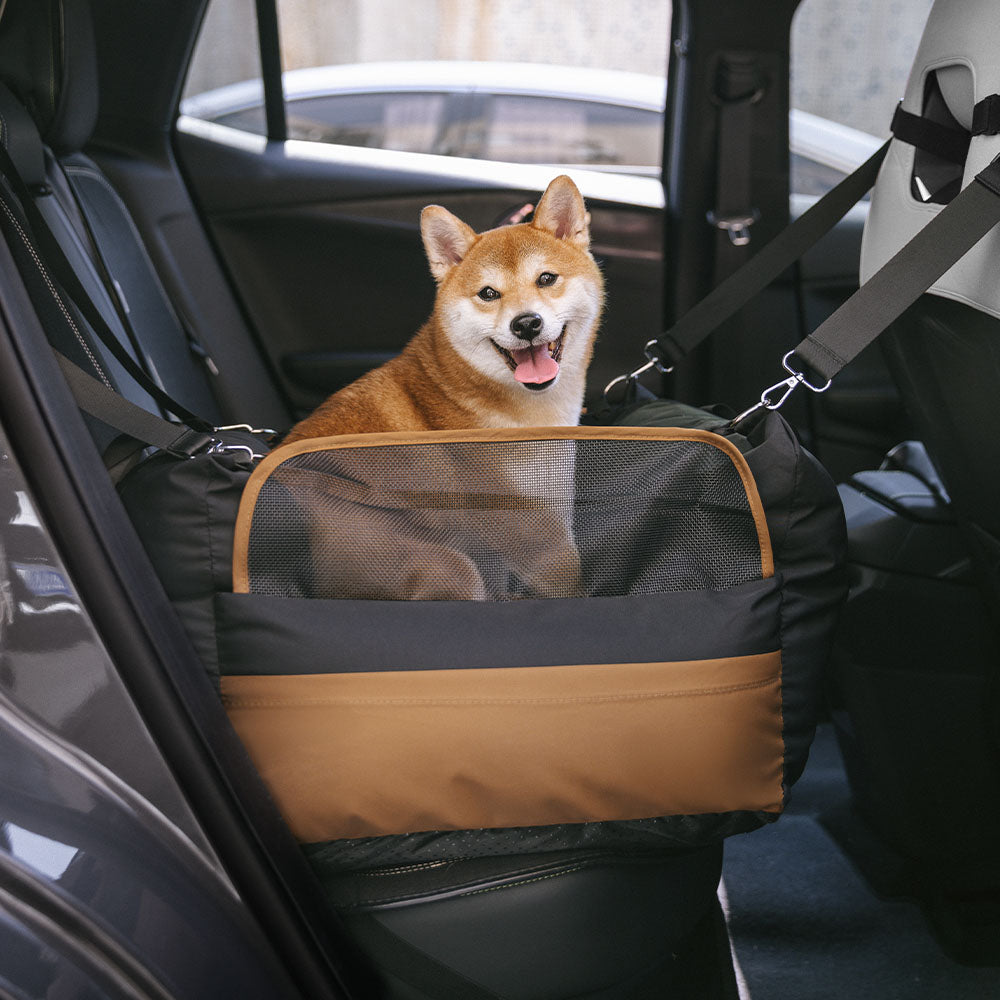 Elevated black dog car seat with storage pocket for pet essentials, medium size