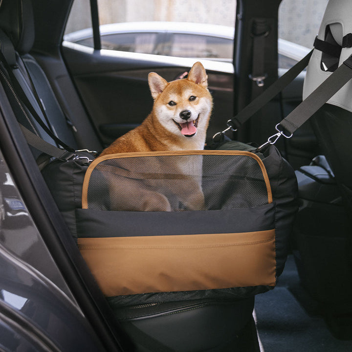 Elevated black dog car seat with storage pocket for pet essentials, medium size