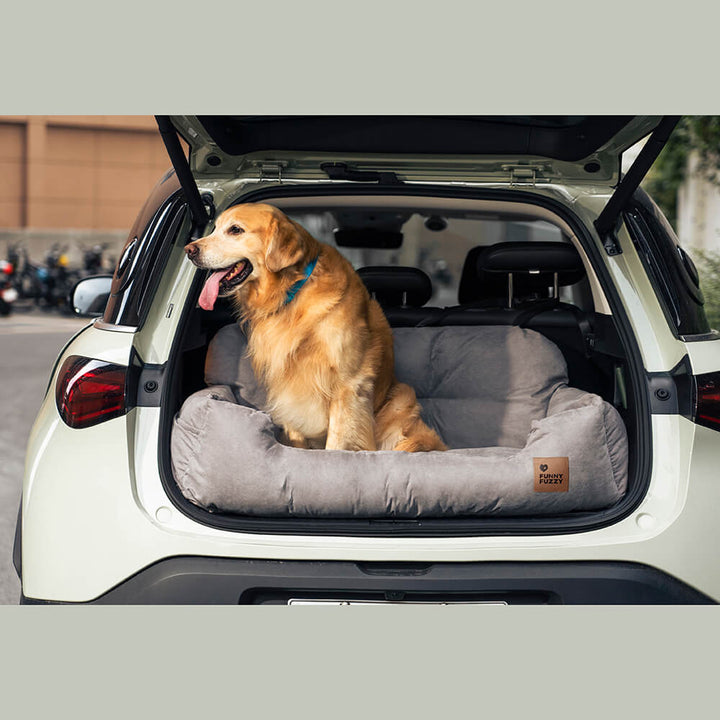 Large dog car back seat bed, grey, with soft bolsters for travel comfort.