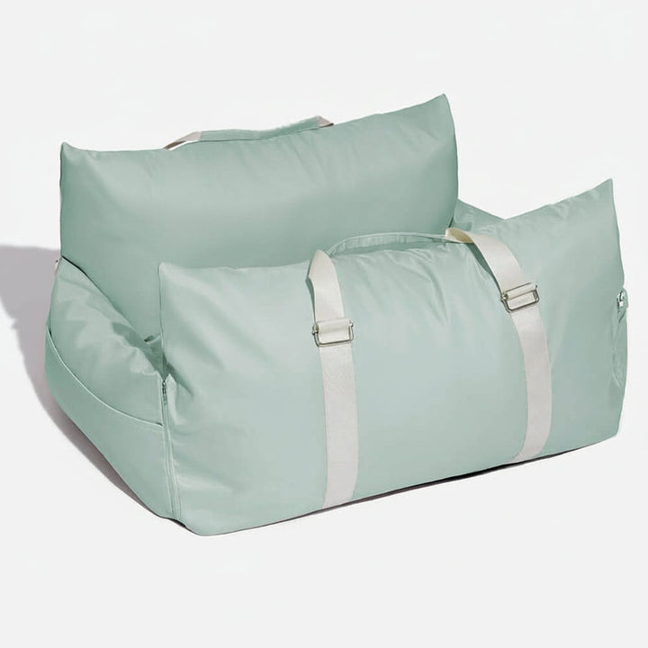 Small dog car booster seat with safety belt, non-slip base for secure and cozy journeys.