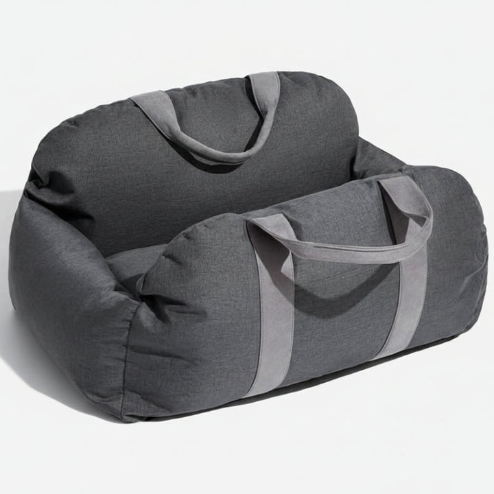 Close-up of the adjustable safety belt on a dog car booster seat for pet security.