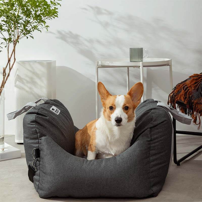 Dog travel booster seat, grey with plaid pattern, stylish and functional pet accessory.